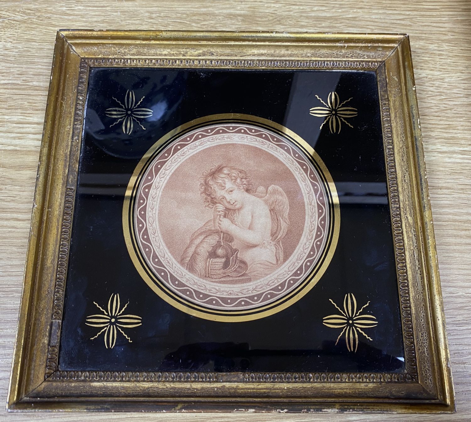 Bartolozzi, pair of circular classical engravings on silk, in Hogarth frames, 33cm and another on paper, verre eglomise frame, 22cm